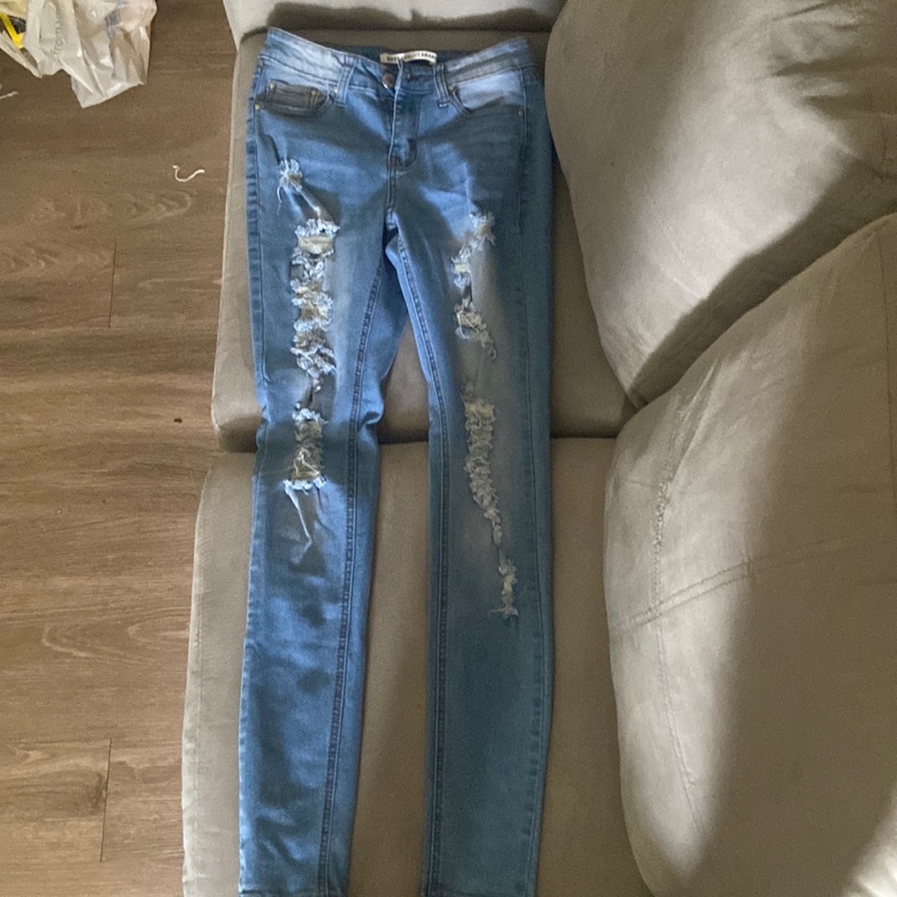 Ripped Light Blue Jeans